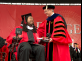 President Barchi presents Eric LeGrand with his Rutgers diploma 